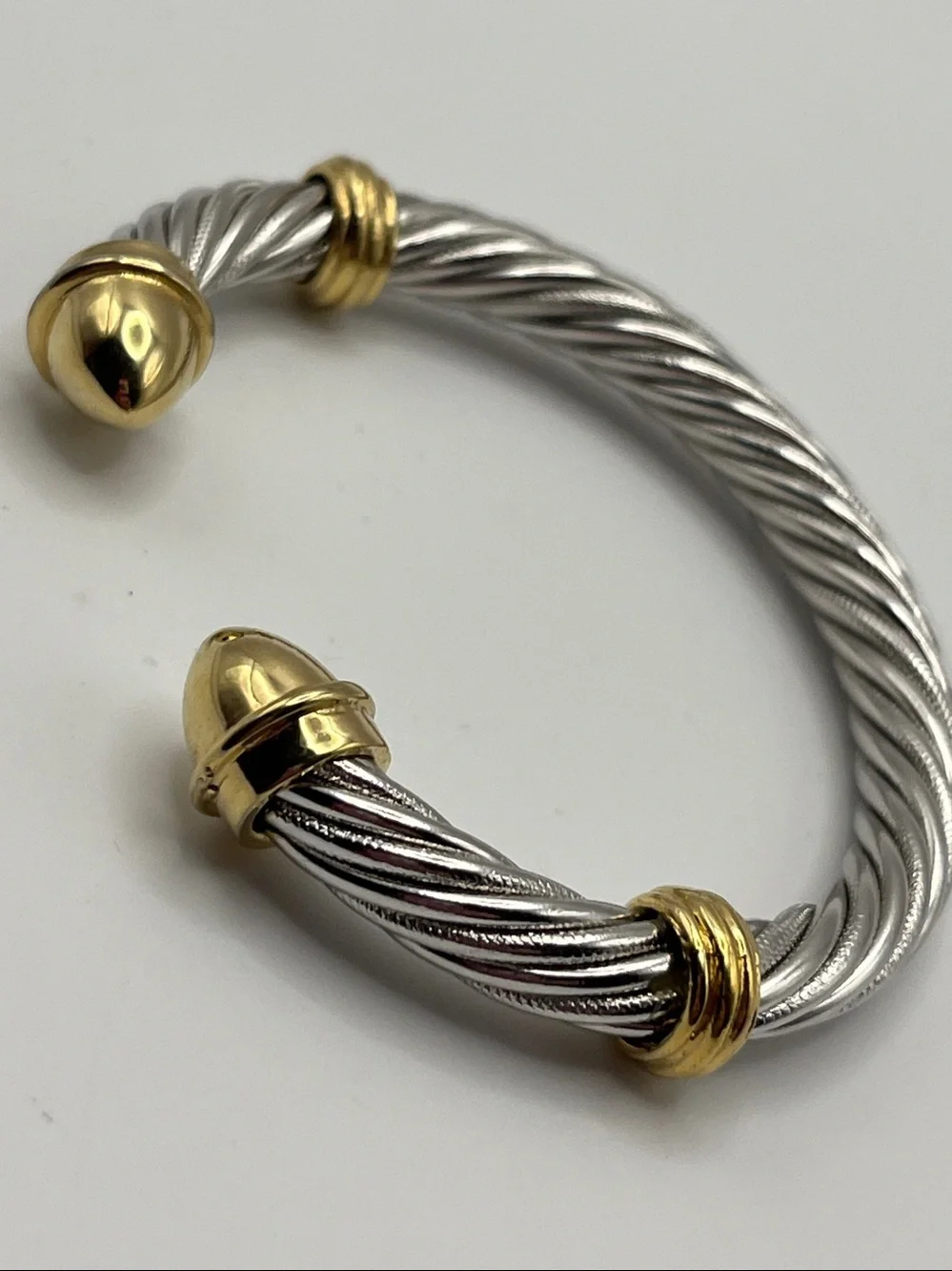 Silver-Tone Twisted Cable Cuff Bracelet with Gold Tone Accents